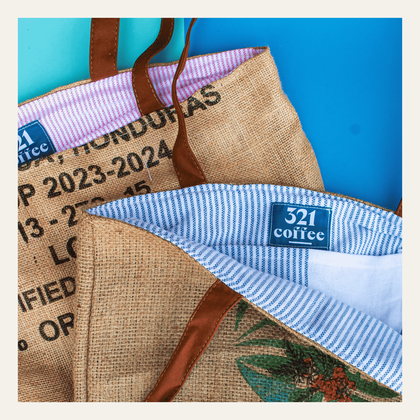Two tote bags made from upcycled burlap are shown open to display colorful lining.