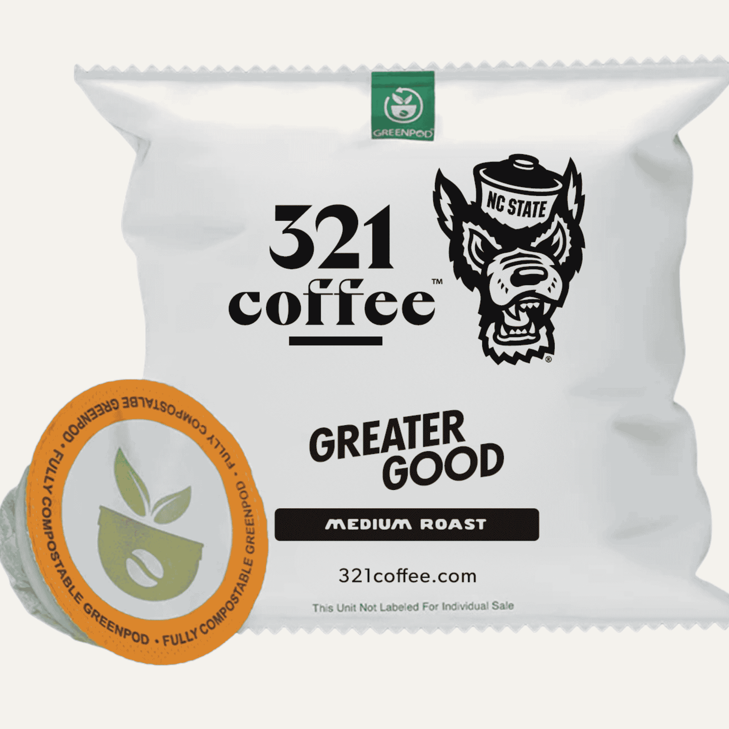 Greater Good coffee pod packaging wrapper shown with a compostable coffee pod out of the wrapper.