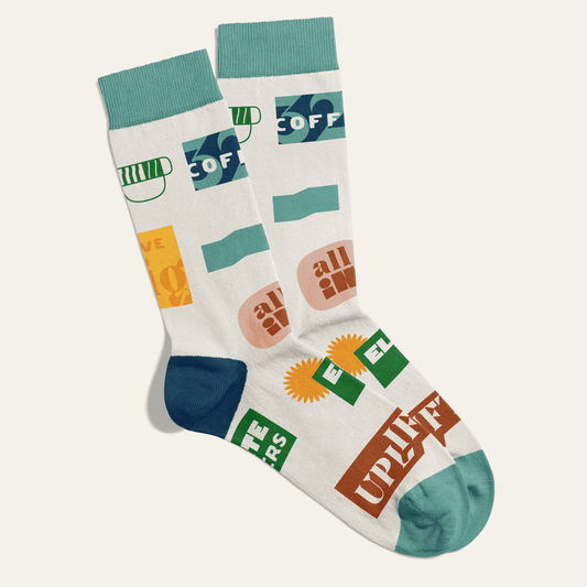 Graphic showing a pair of socks with 321 Coffee logos and graphics on it.