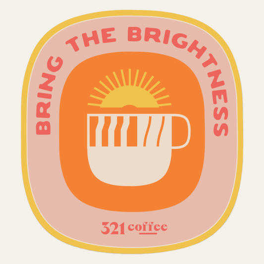 A coffee cup is shown with a sun rising out of the cup. "Bring the Brightness" is displayed in text over the cup. "321 Coffee" is displayed in text under the cup. The magnet is done in orange, yellow, and red.