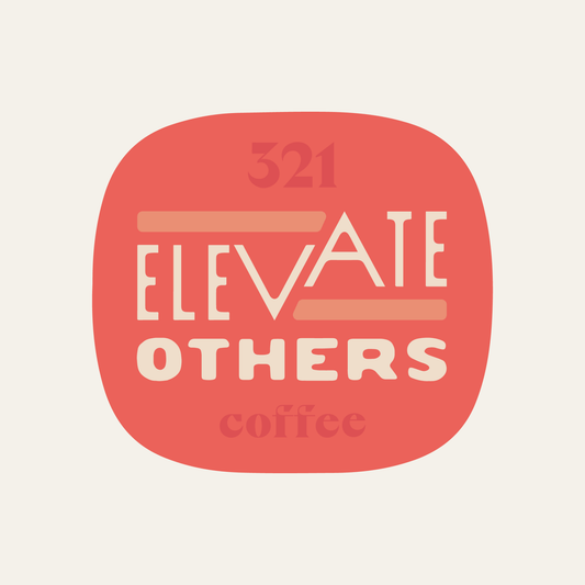 A red background sticker with "Elevate Others" written in the middle. "321" is written at the top with "coffee" at the bottom.