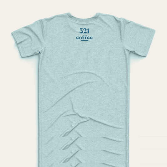 The back of a teal t-shirt showing "321 "Coffee" in blue located at the top of the shirt just under the collar.